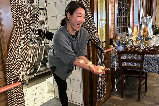 Amalfi Coast Cooking Class: Make Pasta, Mozzarella & Tiramisu - Stretching mozzarella by hand