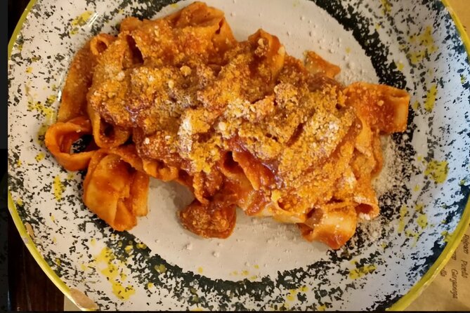 Authentic Pasta and Tiramisù cooking class at spanish steps - Wine, water, and limoncello with the meal