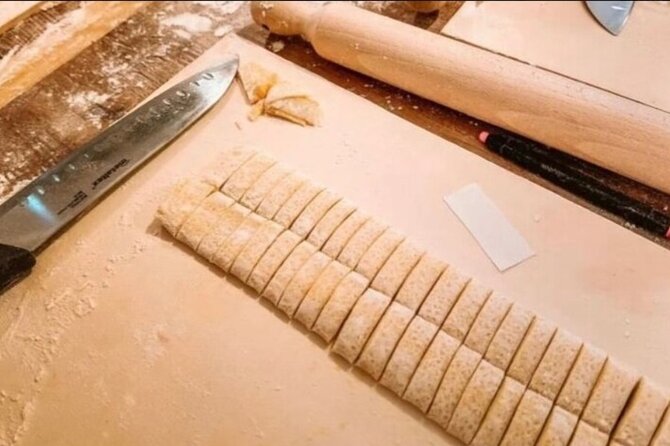 Authentic Pasta and Tiramisù cooking class at spanish steps - Turning flour and egg into fresh fettuccine