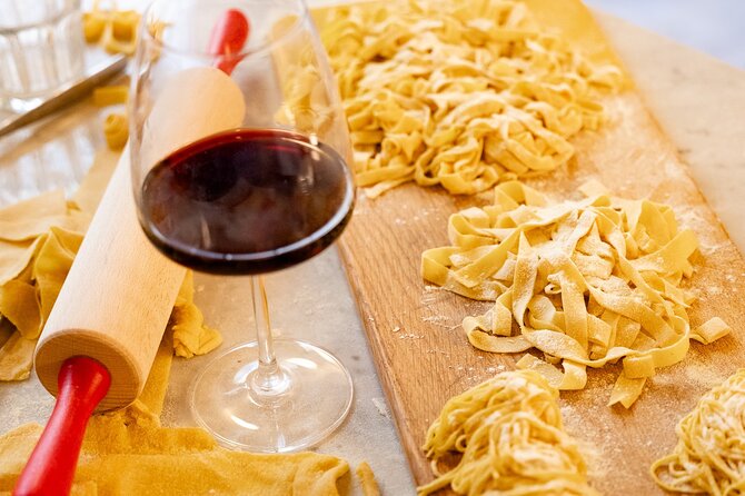 Authentic Pasta and Tiramisu with Unlimited Wine in Florence - Wine, conversation, and the meal