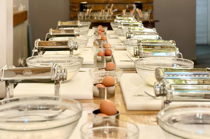 Bari: Pasta and Tiramisu Cooking Class with Wine - Sitting down to eat what you made