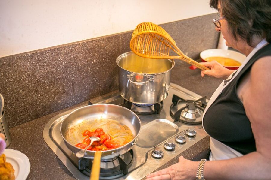 Bari: Pasta & Tiramisu Cooking Class at a Local's Home - Sitting down to eat what you made