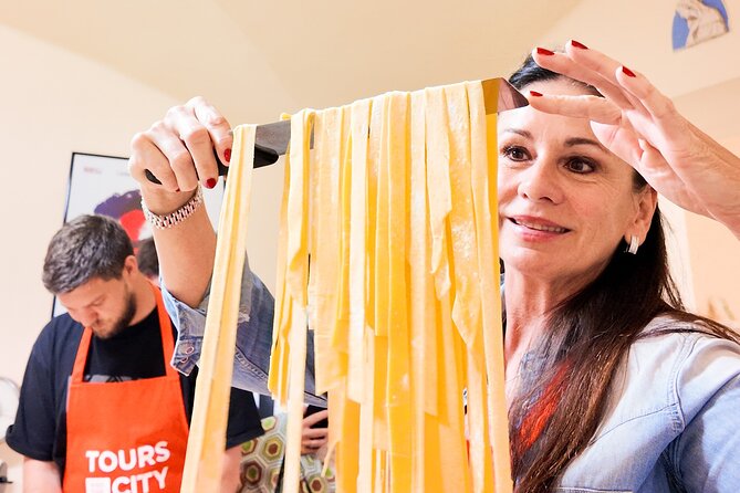 Bologna Local Pasta Cooking Class, Ragu, Spritz, Wine & Gelato - Making a Casoni spritz with local character