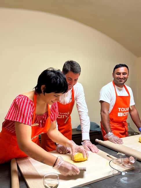 Bologna: Pasta Cooking Class, Ragu, Spritz, Wine & Gelato - Mixing dough the Bolognese way