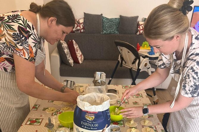 Cagliari Cooking Class: Sardinian Ravioli, Wine & Local Flavors - Rolling dough for fresh tagliatelle