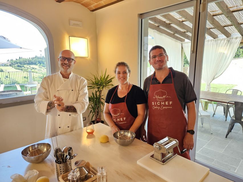 Chianti: Fresh Pasta Class With Lunch or Dinner - A welcome drink with Barberino Val d’Elsa in view