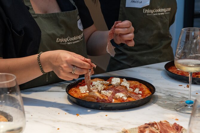 Cook & Dine in Rome: Pizza, Ravioli & Gelato with Unlimited Wine - Rolling pasta and shaping fresh ravioli
