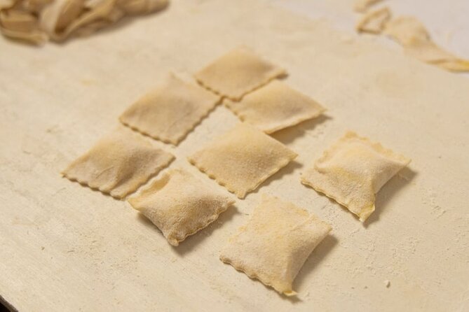 Fettuccine Ravioli and Tiramisu Cooking Class in Rome - Shaping ravioli with butter and sage