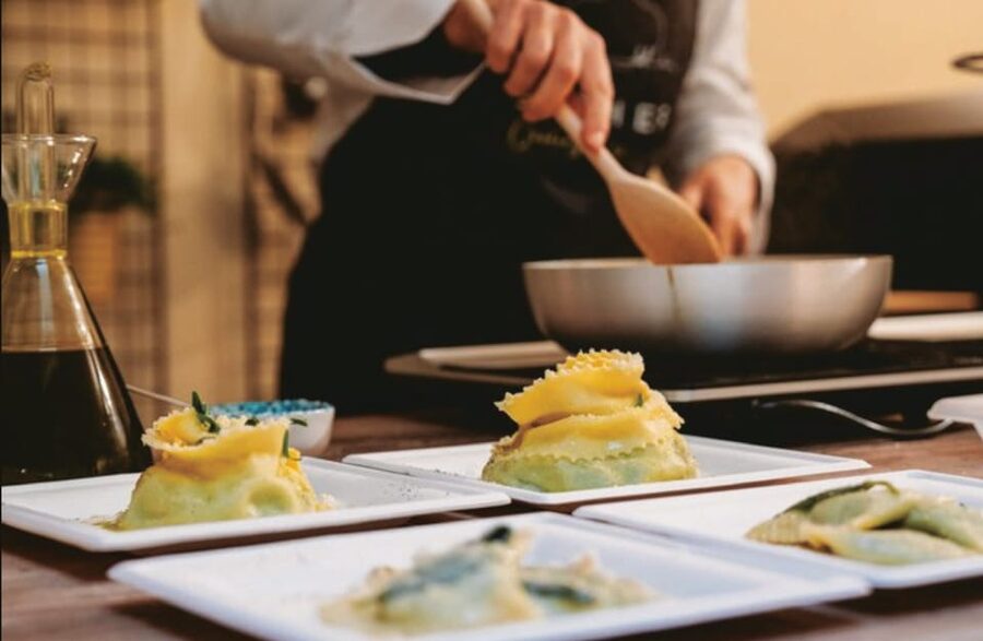 Florence: Fresh Pasta and Tiramisu Cooking Class - Sitting down to eat what you prepared