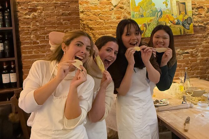 Florence: Pasta & Tiramisu Cooking Class with lots of Good Wine - Sitting down to eat with wine