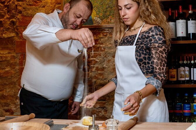 Florence: Tiramisu & Pasta Cooking Class with Unlimited Wine - Wine, conversation, and the restaurant atmosphere
