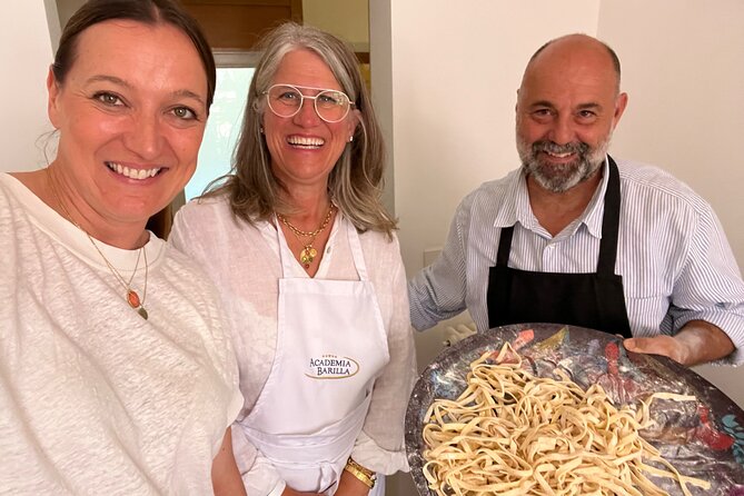 Homemade pasta Cooking Class & Home Restaurant in Rome - Sitting down to the meal you prepared