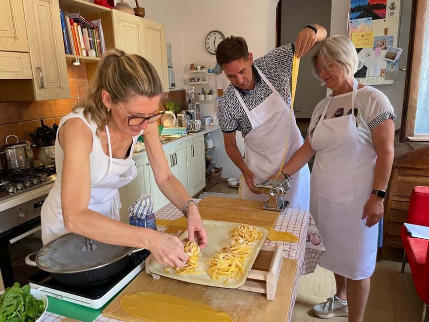 Iseo: Italian cooking class for homemade pasta and traditional desserts - Sitting down to eat what you made