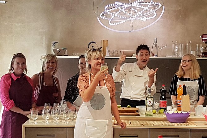 Italian Cocktail + Art of Making Pasta Cooking Class In Unique Milan Location - Sitting down to eat what you made
