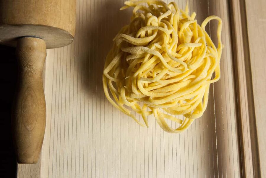 Italy: Pasta and Tiramisu Cooking Class at Home - Sitting down to taste what you prepared
