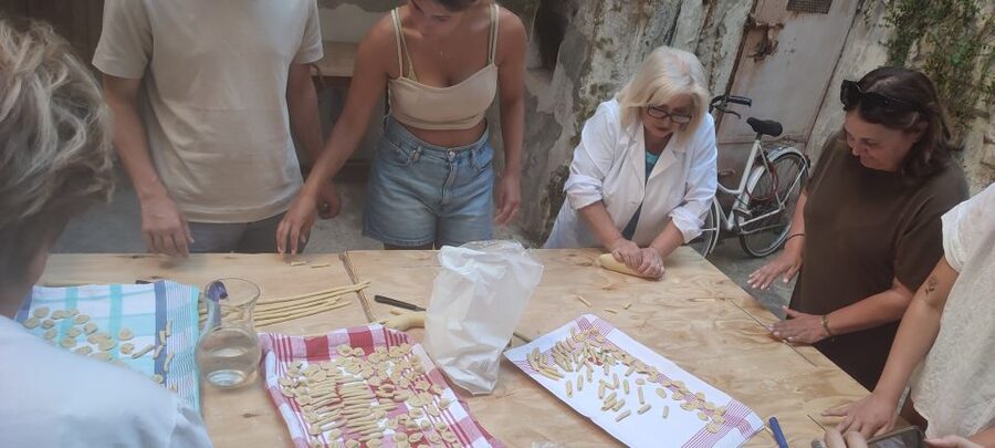 Lecce: Pasta Making Class in 1400s-Era Courtyard with Wine - From worktable to shared dinner