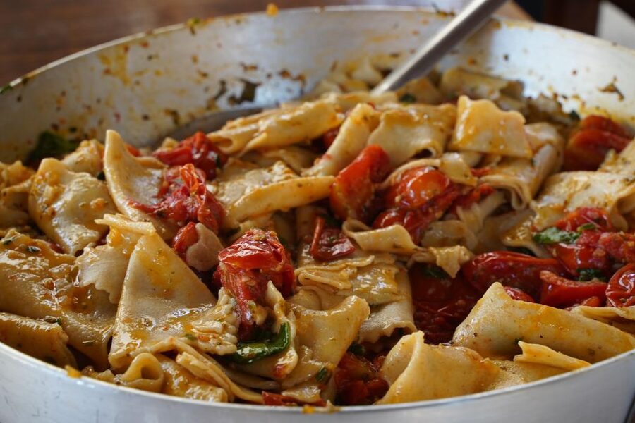 Lucca: Pasta Cooking Class with a Local Chef - Sitting down to eat what you made
