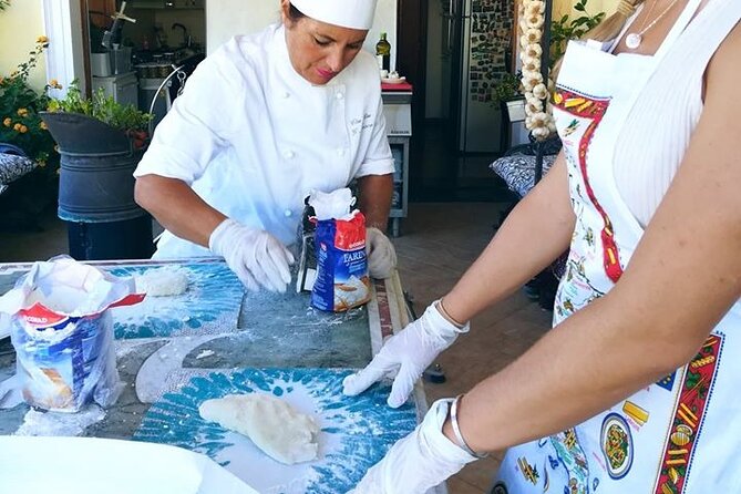 Naples Small-Group Homemade Neapolitan Gnocchi Cooking Class - Sitting down to eat what you made