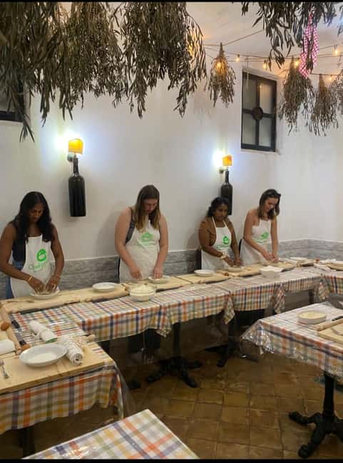 Pasta and tiramisù Cooking class with Wine at Piazza Navona - Choosing a sauce and sitting down to eat