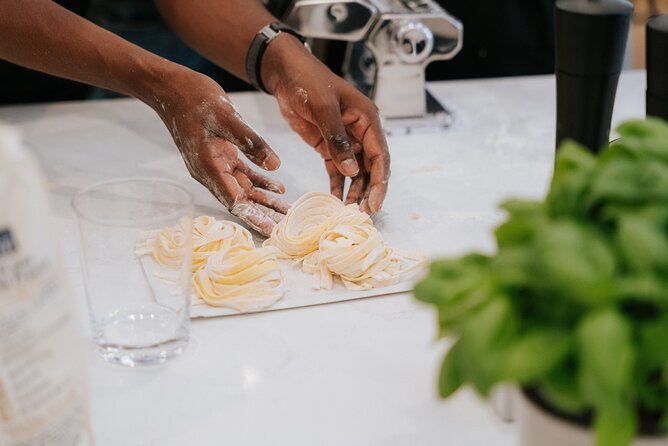 Pasta and Tiramisu Semi-Private Cooking Class with a MasterChef - Layering tiramisu from start to finish