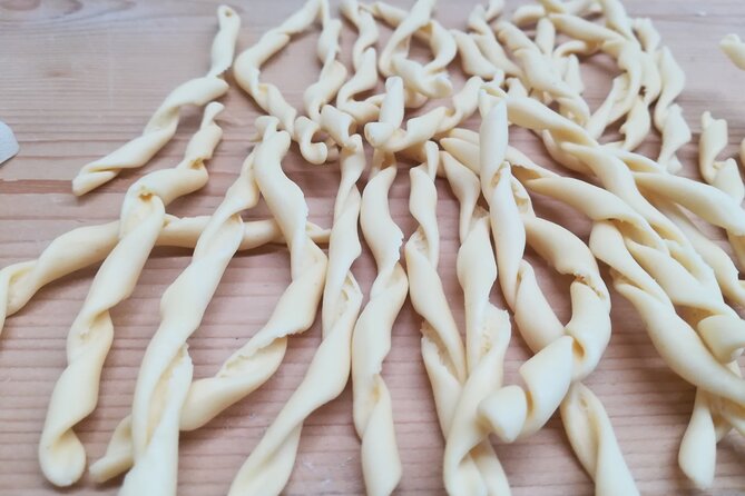 Pasta Cooking Lesson and Lunch on Garda Lake - Mixing semolina and water by hand
