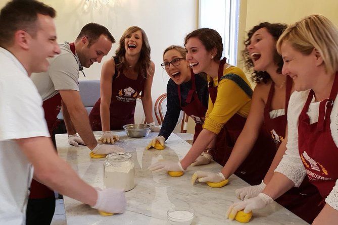 Pasta Making and Tiramisù Class in Rome (SHARED) - Cooking pasta behind Piazza Navona