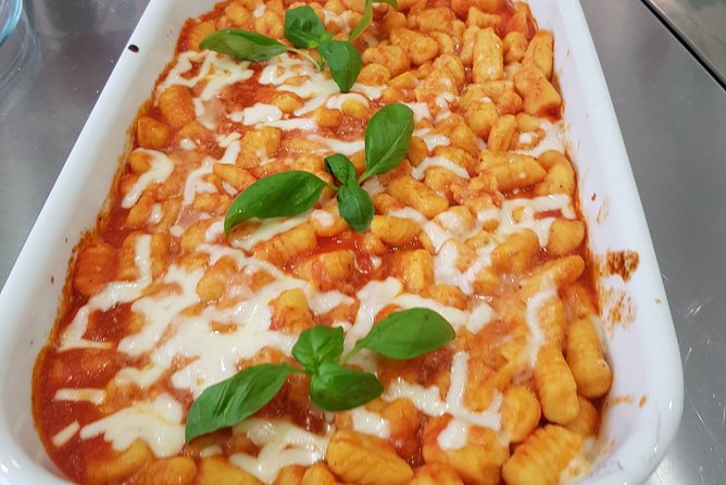 Private Gnocchi Cooking Class with Professional Chef in Padova - Mixing potatoes, flour, and eggs into dough
