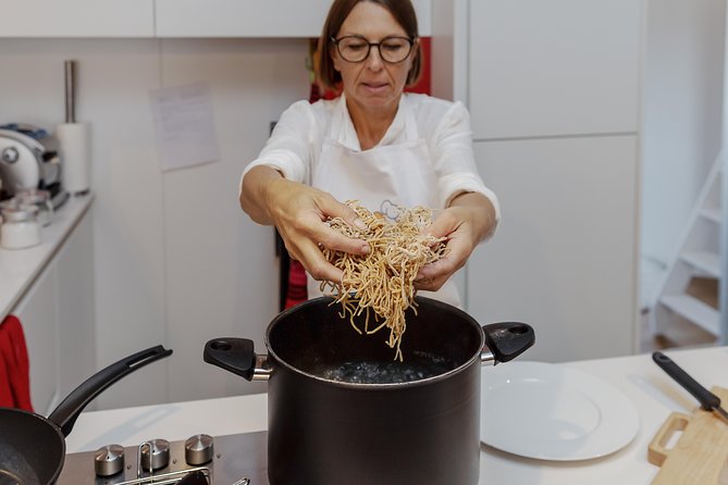 Private Pasta & Tiramisu Class at a Cesarina's home with tasting in Bergamo - Cooking pasta in a Bergamo home