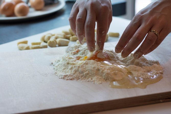 Rome Cooking Class: Gelato and Fettuccine Small Group Experience - Sitting down to eat what you made