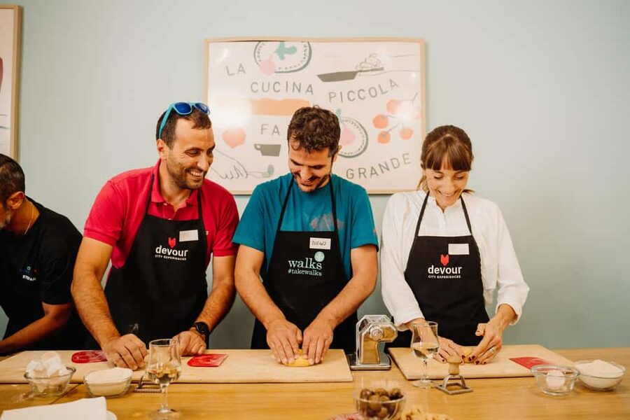 Rome: Fresh Pasta-Making Class with Wine and Gelato - Shaping ravioli and preparing the filling