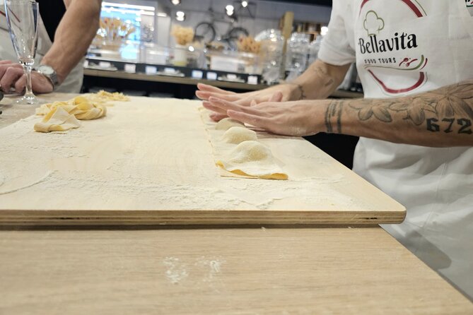 Rome: Hands-on Fettuccine, Ravioli & Tiramisu Cooking Class - Sitting down to eat what you made