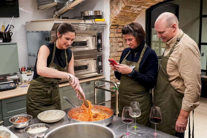 Rome: Hands-On Pasta & Tiramisu Class with Unlimited Wine - Shaping ravioli with seasonal fillings