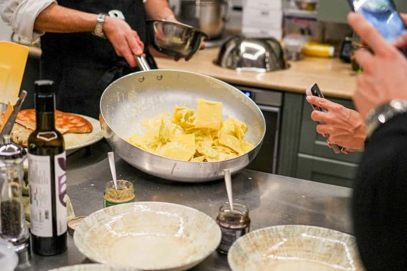 Rome: Hands-On Pasta & Tiramisu Class with Unlimited Wine - A central location, with one detail to confirm