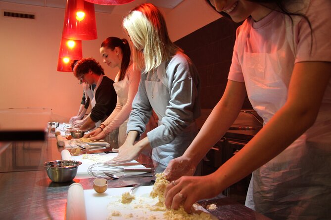 Rome: Lasagna, Fettuccine Pasta and Tiramisu Cooking Class - Layering the lasagna