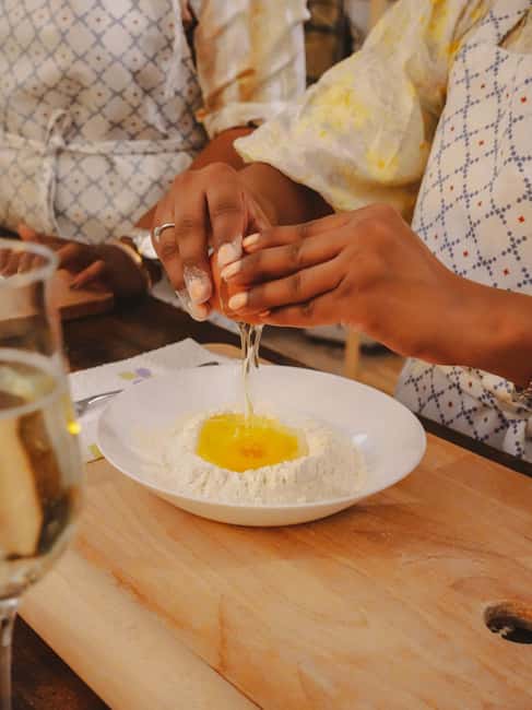 Rome: Pasta Class with 3 Spritz or Tiramisu by the Colosseum - Rolling fettuccine by hand