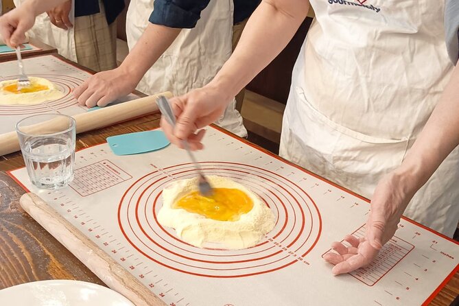 Rome: Pasta Cooking Class, Dinner & Wine in Authentic Restaurant - Sitting down to eat your own work