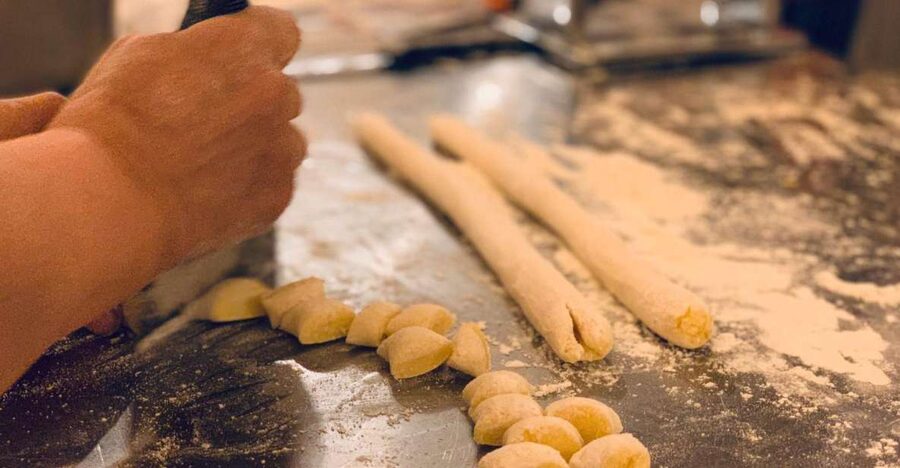 Rome: Pasta & Tiramisu Class with Free Flowing Fine Wine - Rolling out handmade pasta