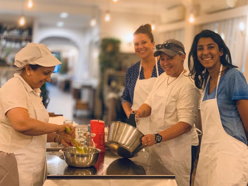 Rome: Pasta & Tiramisu Class with Free Flowing Fine Wine - Sitting down to a three-course meal