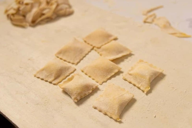 Rome: Ravioli, Fettuccine and Tiramisu Cooking Class - Sitting down to eat what you made