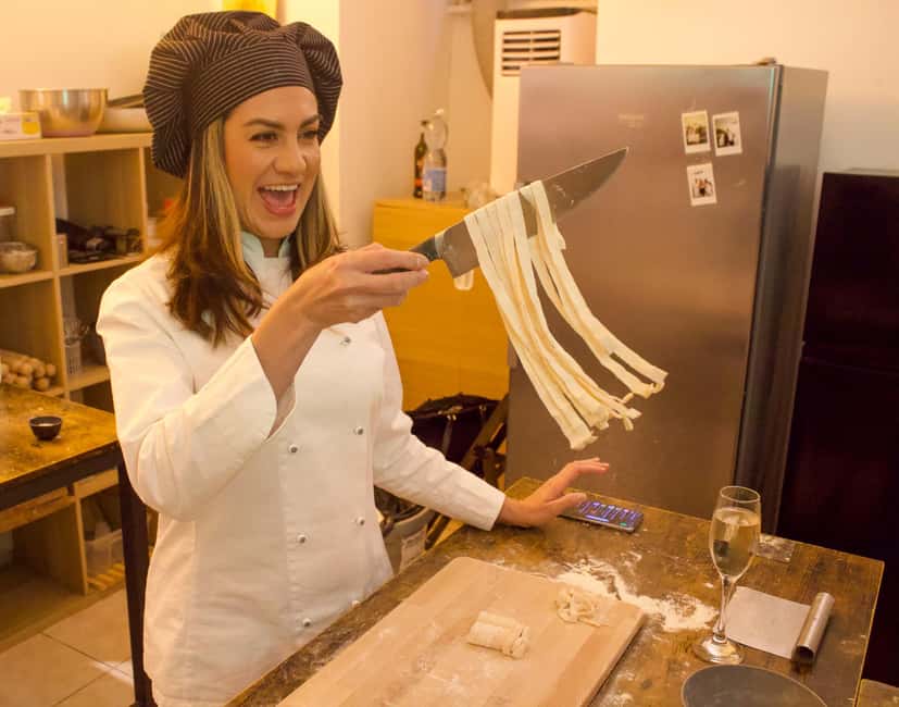 Rome: Tiramisu and Pasta Cooking Class near the Colosseum - Sitting down to eat your own work