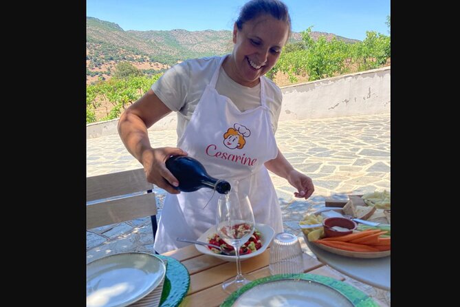 Small group Pasta and Tiramisu at Local Home in Olbia - Sitting down with wine and conversation