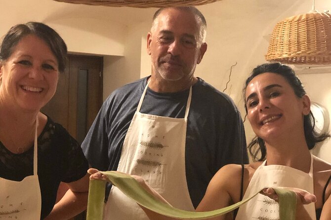 Small-Group Pasta Making steps from the Vatican Museums - Arriving with wine and Roman snacks