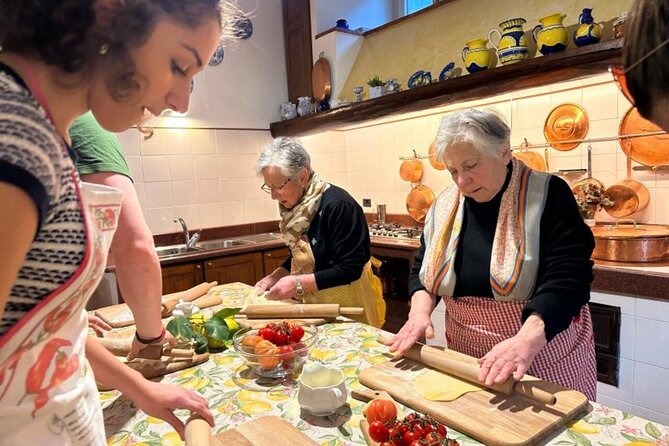 Sorrento: Private Pasta & Tiramisu Class at a Local's Home - Cooking pasta in a Sorrento family home