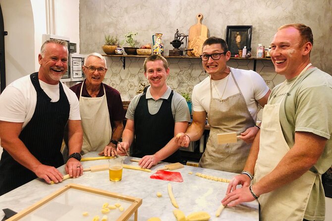 Super Fun Pasta & Gelato Class by Vatican with Wine + Oil Tasting - Rolling pasta with your own hands