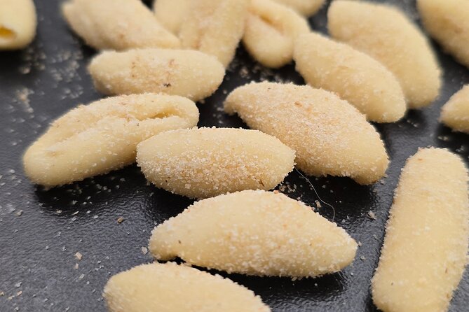 Vegan Pasta in Verona in a family home Kitchen - Milling flour before making the dough