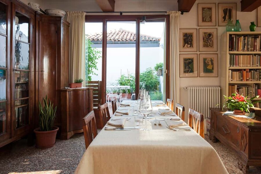 Venice: Cooking Class with Tiramisu and Pasta Making - Cooking pasta in a Venetian palace