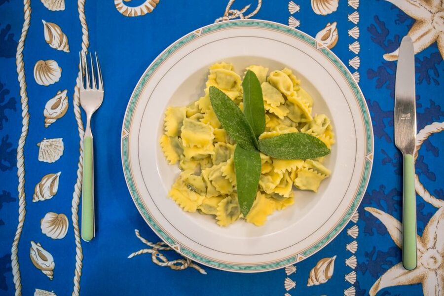 Verona: Pasta & Tiramisu Cooking Class at a Local's Home - Rolling sfoglia by hand in a local kitchen